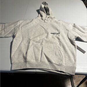 Essential M men’s hoodie color “Light Oatmeal”
Never worn with tags